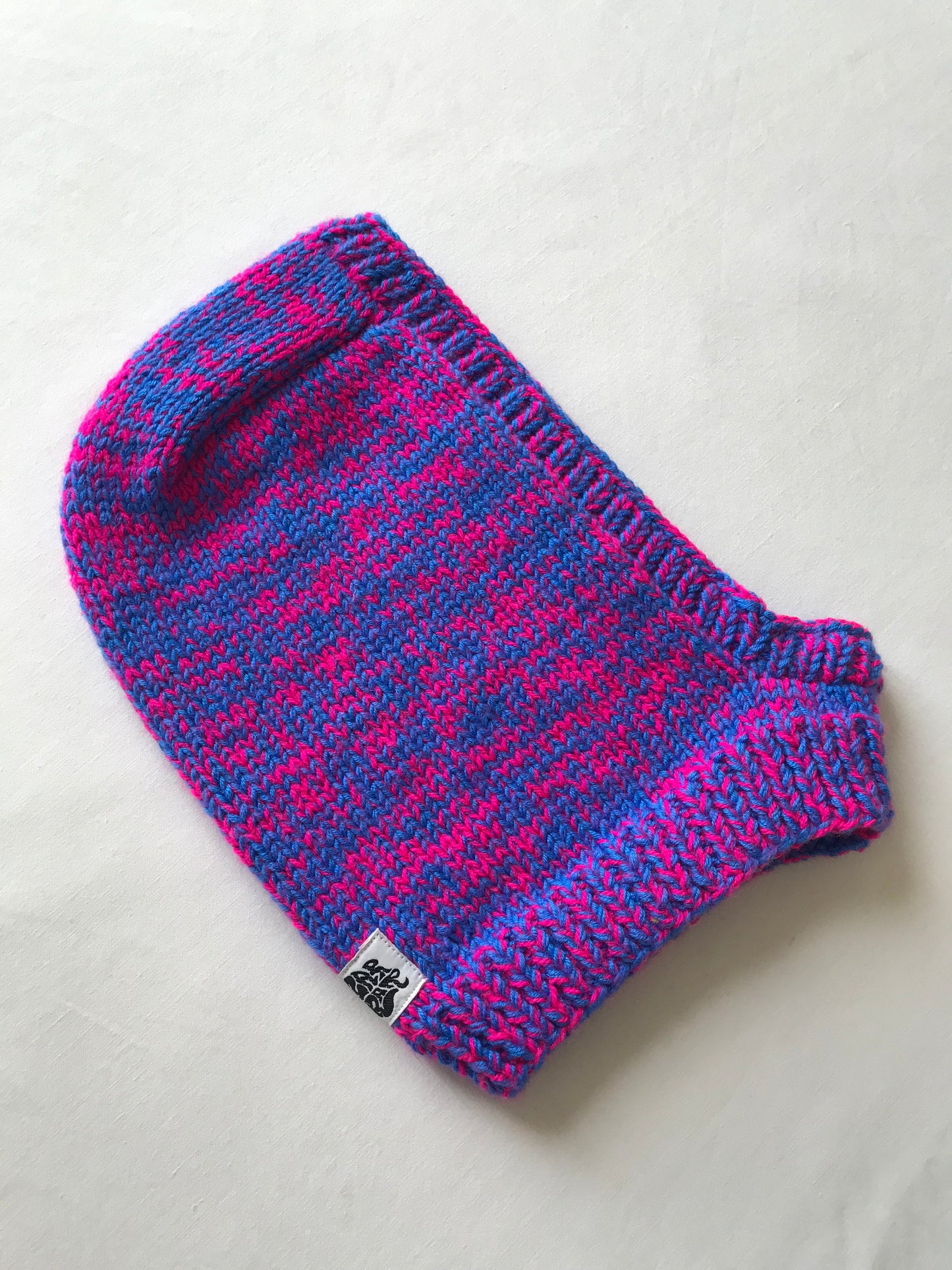 Cagoule bleu et rose fluo